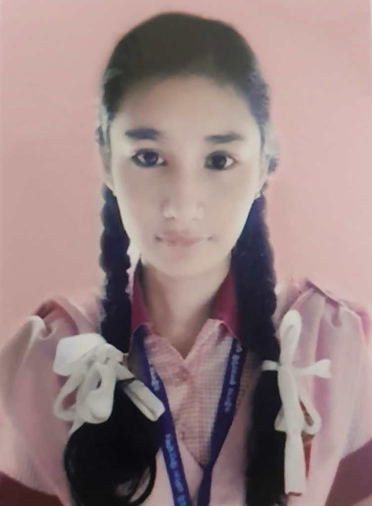 Portrait of Rupsha Saha, first-place performer at JCP Academy in the Madhyamik 2025 examination.